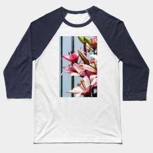 Fresh pink lilies at the fence background Baseball T-Shirt